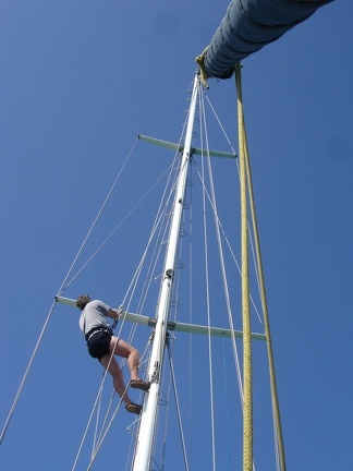 Dsc07313 Skipper fixing courtesy flag halyard 001